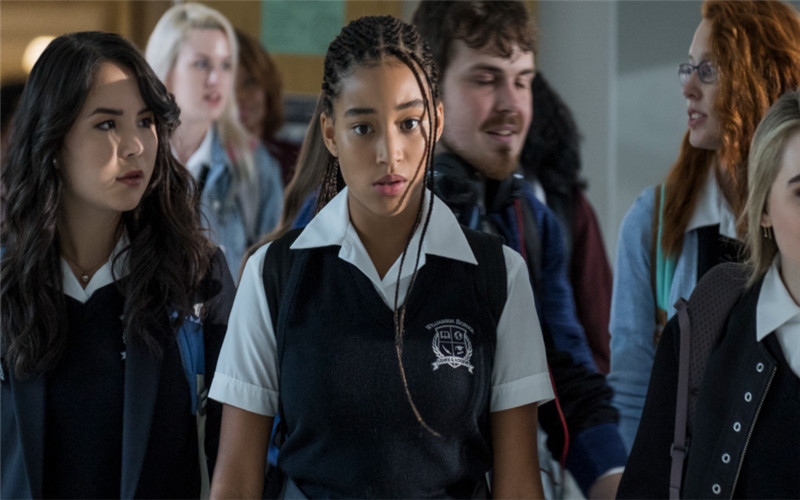 Amandla Stenberg plays Starr Carter in The Hate U Give 2018 movie.