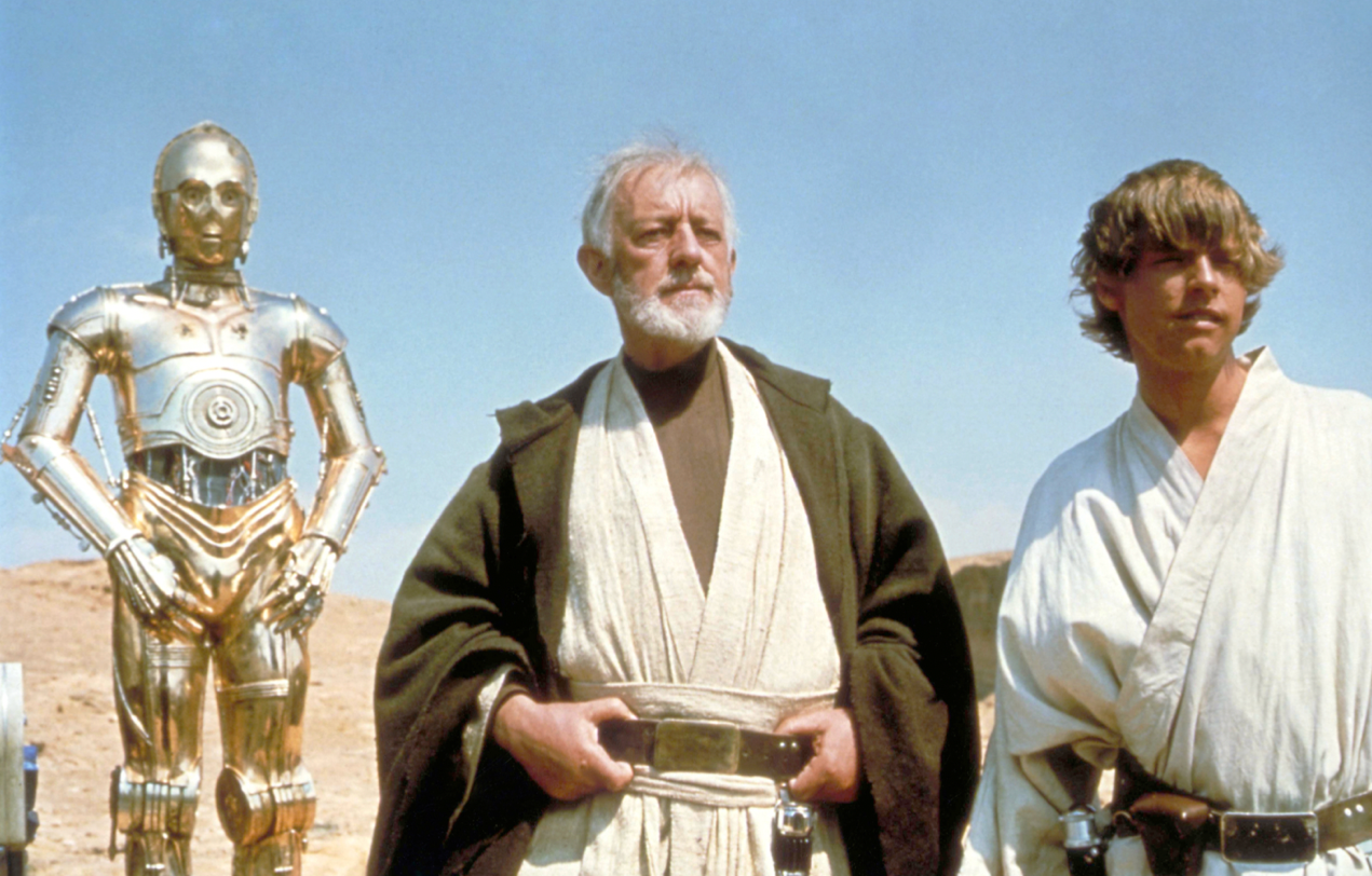 Alec Guinness, Anthony Daniels, and Mark Hamill in Star Wars (1977)